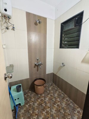 Bathroom in 1 BHK Apartment at Nisarg Hyde Park, Kharghar – for Rent