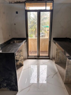 Kitchen in 1 BHK Apartment at Puranik Hometown, Ghodbunder Road – for Rent