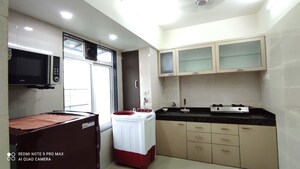 Kitchen in 1 BHK Apartment at Onkar CHS, Goregaon East – for Rent