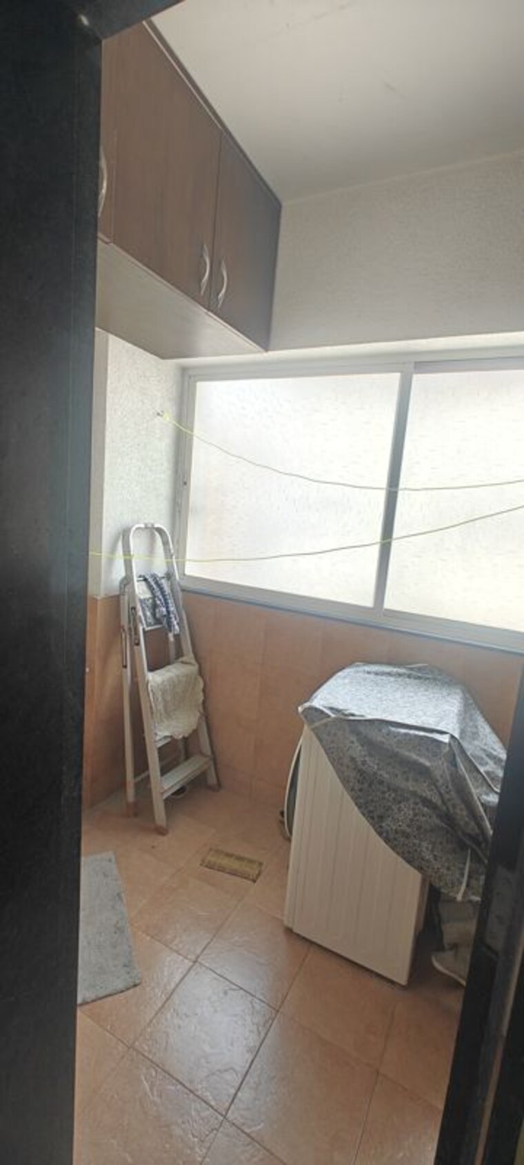 Laundry Area, atrium-skyward 1 Bedroom 600 Sq.Ft. Apartment In Undri Pune 10733482