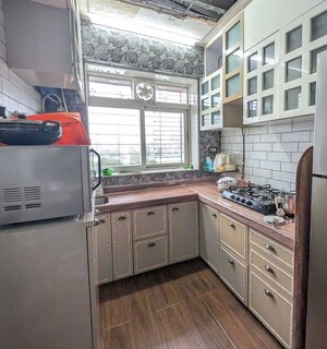 Kitchen in 2 BHK Apartment at Rohan Lifescapes Mirage, Matunga West – for Sale