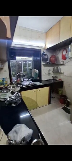 Kitchen in 2 BHK Apartment at Shyam Gokul Garden, Kandivali East – for Sale