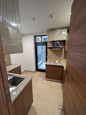 Kitchen in 2 BHK Apartment at Krisumi Waterfall Residences, Sector 36a – for Sale