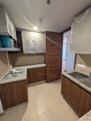 Kitchen in 2 BHK Apartment at Krisumi Waterfall Residences, Sector 36a – for Rent