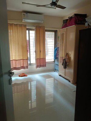 Bedroom in 2 BHK Apartment at Tanishq Hollyhock, Matunga East – for Sale