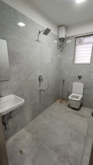 Bathroom in 2 BHK Apartment at Pratham Prerana CHS, Andheri West – for Rent