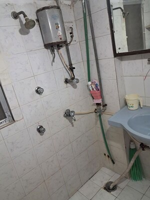 Bathroom in 1 BHK Apartment at Gokul Garden CHS, Kandivali East – for Rent