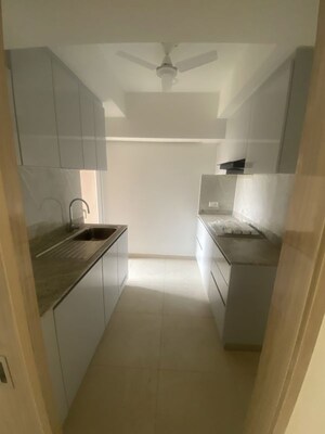 Kitchen in 3.5 BHK Builder Floor at DLF Gardencity Enclave, Sector 93 – for Sale