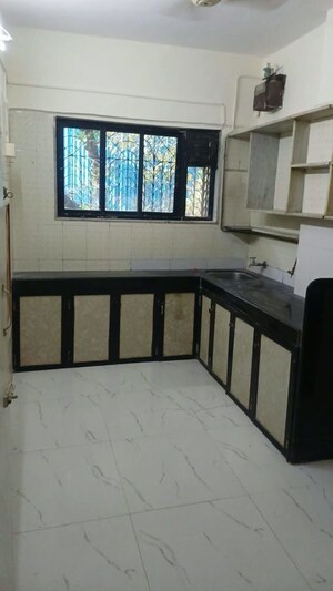 Kitchen in 1 BHK Apartment at Sukratara Apartment, Vile Parle East – for Rent