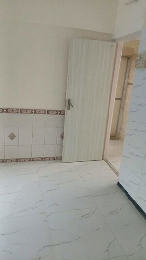 Bathroom in 1 BHK Apartment at Sukratara Apartment, Vile Parle East – for Rent