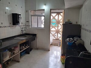 Kitchen in 3 BHK Apartment at Elite Empire Apartment, Balewadi – for Rent