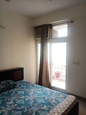 Bedroom in 3 BHK Apartment at Mahagun My Woods, Sector 16c Greater Noida – for Rent