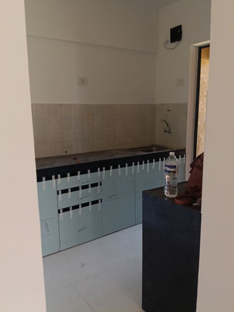 Kitchen, shapoorji-pallonji-joyville-hadapsar-annexe 2 Bedroom 669 Sq.Ft. Apartment In Hadapsar Pune 10733869