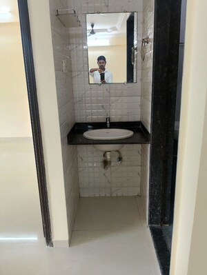 Building Lobby in 2 BHK Apartment at Mahavir Heritage CHS, Kharghar Sector 35g – for Rent