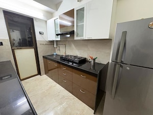 Kitchen in 2 BHK Apartment at VR Bhoomi Acre I Wing, Waghbil – for Rent