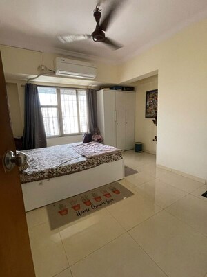 Bedroom in 2 BHK Apartment at Raheja Sherwood, Goregaon East – for Rent