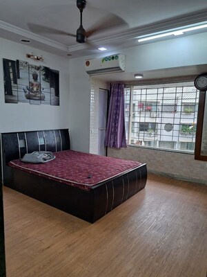 Bedroom in 2 BHK Apartment at Divine Space Meenaxi Tower, Goregaon East – for Rent