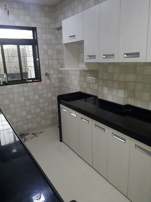 Kitchen in 1 BHK Apartment at Prayag Heights, Dindoshi – for Sale