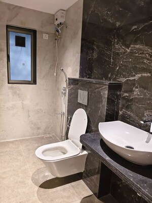 Bathroom in 2 BHK Apartment at Raghdev Bhuvan Apartment, Matunga – for Sale