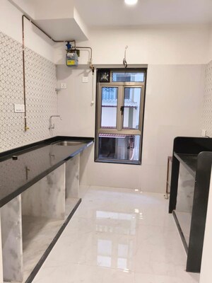 Kitchen in 2 BHK Apartment at Raghdev Bhuvan Apartment, Matunga – for Sale