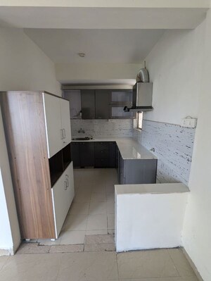 Kitchen in 2 BHK Apartment at Unitech Uniworld Gardens 2, Sector 47 – for Rent