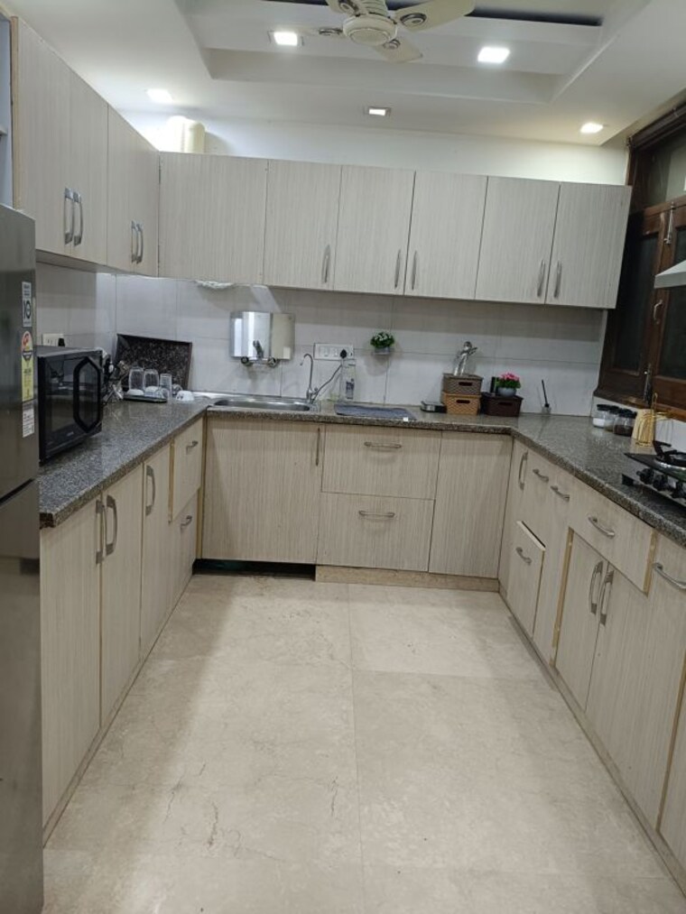 Kitchen, maharani bagh 4 Bedroom 500 Sq.Yd. Builder Floor In Maharani Bagh Delhi 10734079