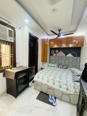 Bedroom in 2 BHK Builder Floor at Dwarka Mor – for Rent