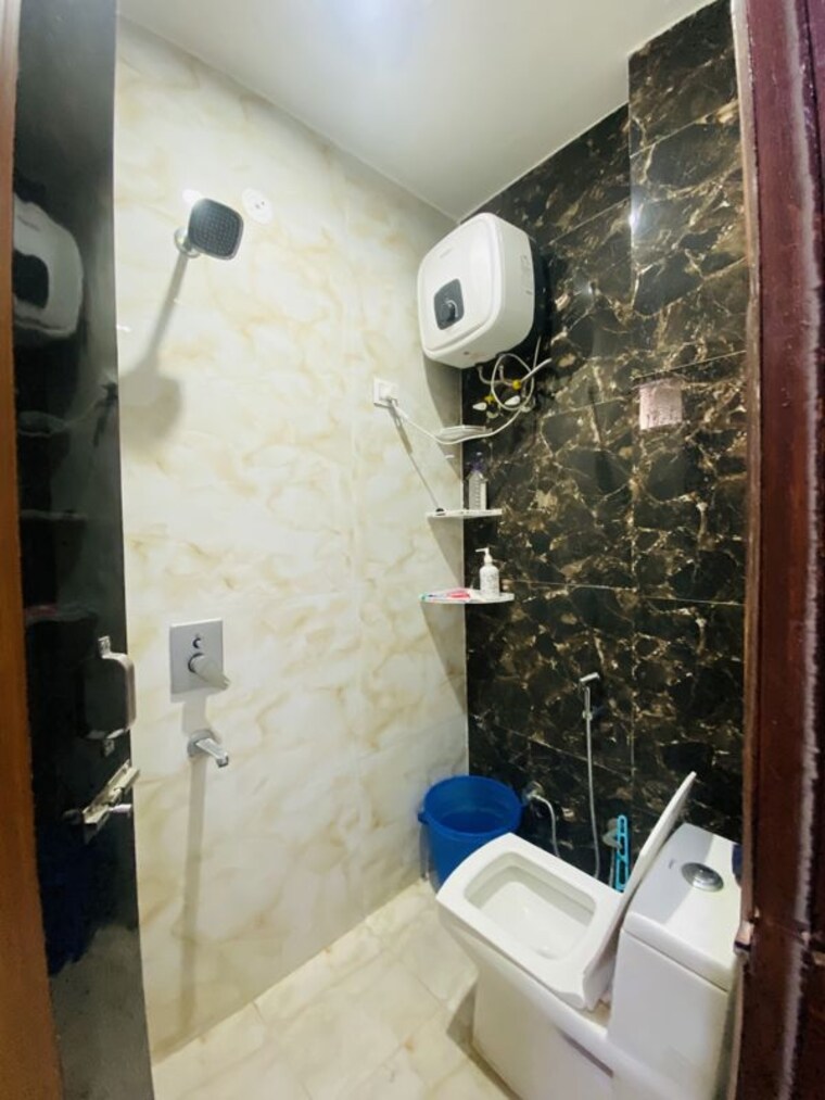 Bathroom, dwarka mor 2 Bedroom 65 Sq.Yd. Builder Floor In Dwarka Mor Delhi 10734216