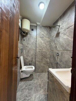 Bathroom in 2 BHK Builder Floor at Chattarpur – for Rent