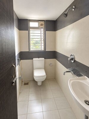 Bathroom in 2 BHK Apartment at Westin Vitthal Darshan CHS, Andheri West – for Rent