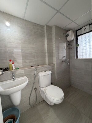 Bathroom in 1 BHK Apartment at Runwal Gardens, Dombivli East – for Rent
