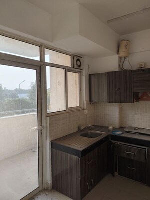 Kitchen in 2.5 BHK Apartment at Godrej 101, Sector 79 – for Rent