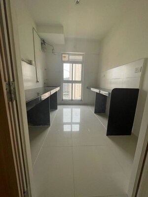 Kitchen in 3 BHK Apartment at Godrej Emerald, Ghodbunder Road – for Rent