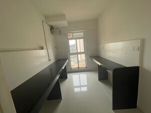 Kitchen in 3 BHK Apartment at Godrej Emerald, Ghodbunder Road – for Rent