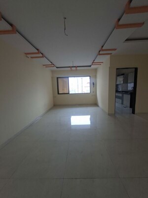 Living Room in 2 BHK Apartment at Ostwal Tower, Shimpoli – for Sale