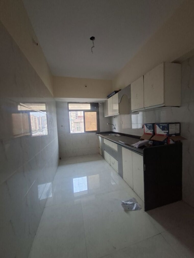 Kitchen, ostwal-tower 2 Bedroom 718 Sq.Ft. Apartment In Shimpoli Mumbai 10734450