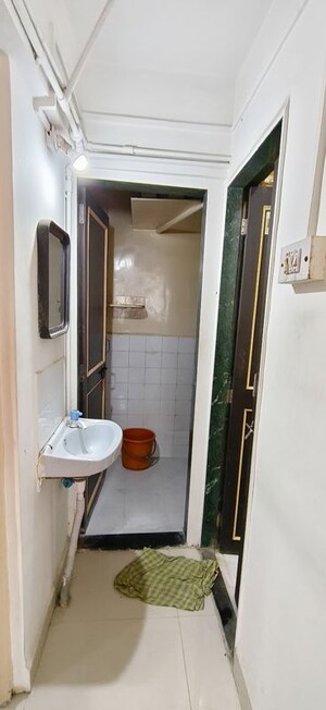 Bathroom in 1 BHK Apartment at Karan Ceto, Wadgaon Sheri – for Rent