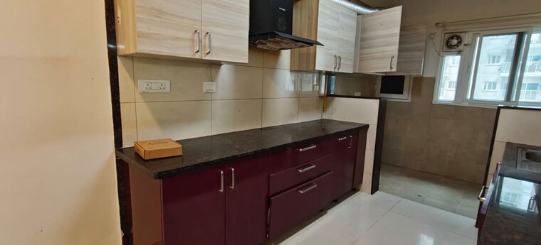 Kitchen, lnt-raintree-boulevard 3 Bedroom 1670 Sq.Ft. Apartment In Hebbal Bangalore 10734707