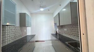 Kitchen in 3.5 BHK Apartment at ATS Homekraft Pious Hideaways, Sector 150 – for Rent