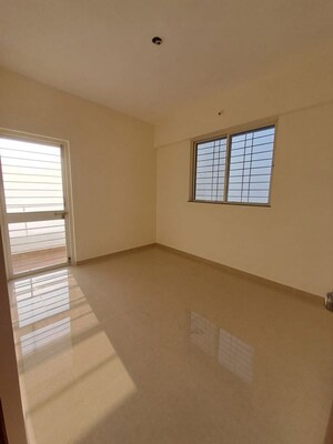 Room in 2 BHK Apartment at Tulip Infinity Planet, Moshi – for Rent