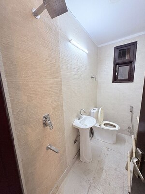 Bathroom in 3 BHK Builder Floor at Khirki Extension – for Rent