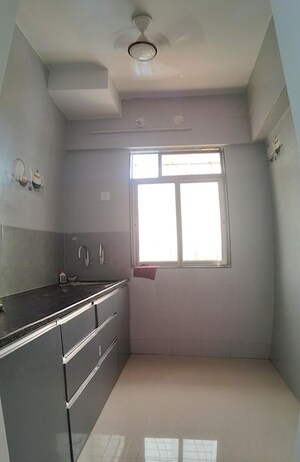 Kitchen in 1 BHK Apartment at Ekveera SB Tower, Dombivli East – for Rent