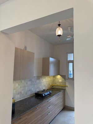 Kitchen in 3 BHK Apartment at ATS Homekraft Pious Hideaways, Sector 150 – for Rent