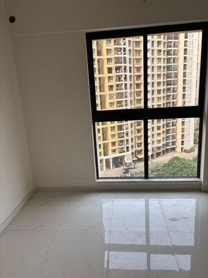 Room in 2 BHK Apartment at Tharwani Riverdale, Khadakpada – for Rent