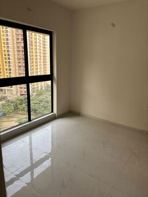 Room in 2 BHK Apartment at Tharwani Riverdale, Khadakpada – for Rent