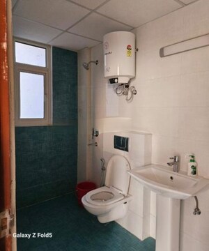 Bathroom in 3 BHK Apartment at Rishita Manhattan, Gomti Nagar – for Rent