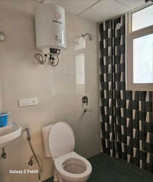 Bathroom in 3 BHK Apartment at Rishita Manhattan, Gomti Nagar – for Rent