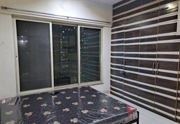 Balcony, sheth-vasant-athena 2 Bedroom 811 Sq.Ft. Apartment In Laxmi Nagar Thane 10735241