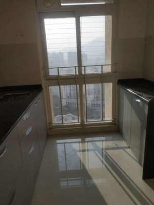 Kitchen in 1 BHK Apartment at Vijay Orovia, Ghodbunder Road – for Sale