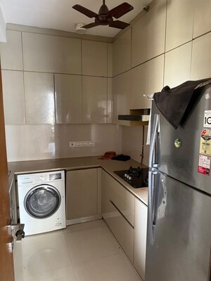 Kitchen in 1 BHK Apartment at One Hiranandani Park, Ghodbunder Road – for Rent